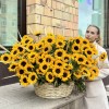 101 подсолнух с гринбеллом в корзине
