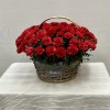 65 красных гвоздик в корзине