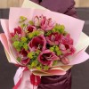 Букет из 7 красно-белых амариллисов с буплерумом