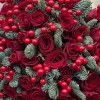 Новогодний букет из 51 красной розы и нобилиса