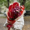 Букет из антуриумов и орхидей
